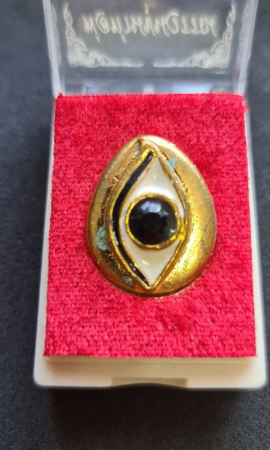 The Nine-Faced Lucky Star & Celestial Eye (BE 2560) The Beacon of Wisdom and the Shield of Fortune