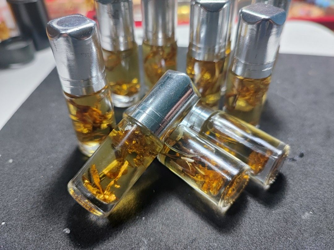 Roon Sang Hai Ruay: The Ultimate Golden Metta Oil for Charisma & Abundance by Kruba Krissana