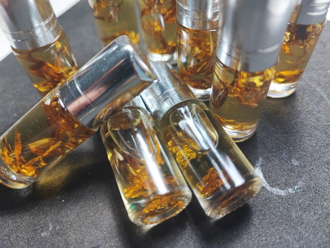 Roon Sang Hai Ruay: The Ultimate Golden Metta Oil for Charisma & Abundance by Kruba Krissana